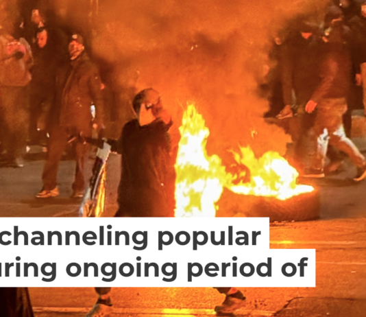 Iranians gather while blocking a street during a protest in Tehran on Jan. 9, 2026. MAHSA/Middle East Images/AFP via Getty Images